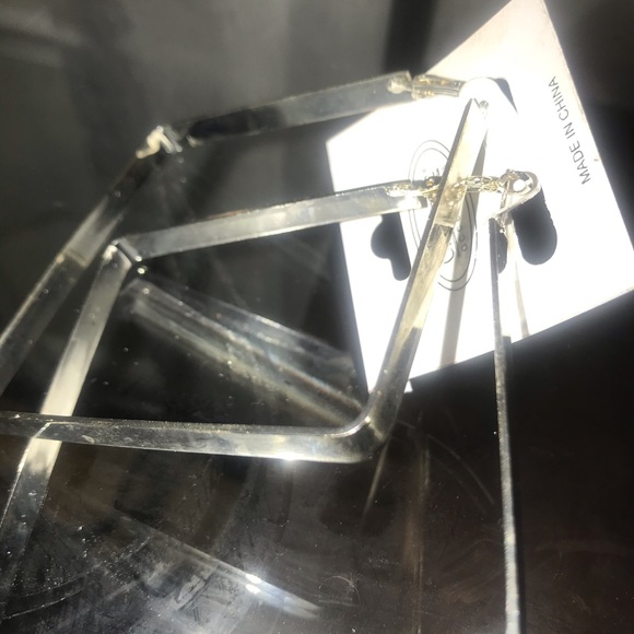 Silver hoop earring - Picture 1 of 3